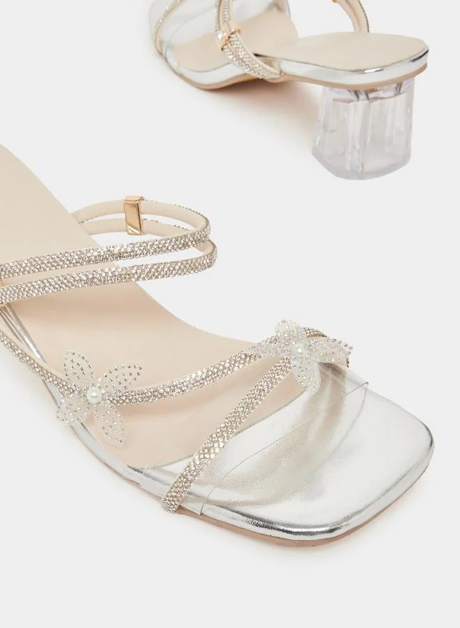 تايك تو صندل نسائي بكعب عريض وفراشة مرصعة بالفصوص